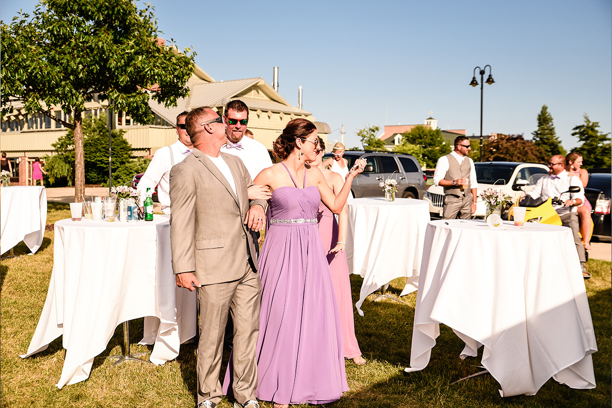 Waterfront wedding party in Sturgeon Bay near Sonny's Italian Kitchen in Door County Wisconsin, offering the most picturesque weddings