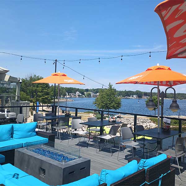 Sonny's Italian Kitchen and Pizzeria tiki bar and patio featuring fire tables and more.