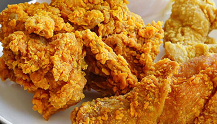 Plate of crispy fried chicken pieces with golden breading, a treat from Sturgeon Bay’s Sonny’s.