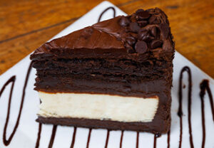 Decadent chocolate cake slice served at our waterfront restaurant in scenic Sturgeon Bay.